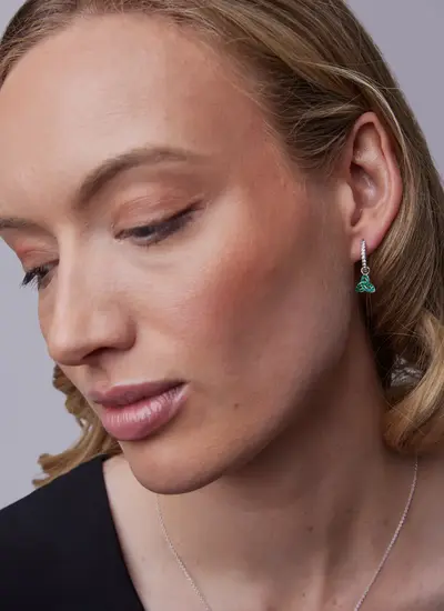 Sterling Silver Trinity Knot Drop Earrings With Sparkling Green Crystals and Clear Crystal Rings